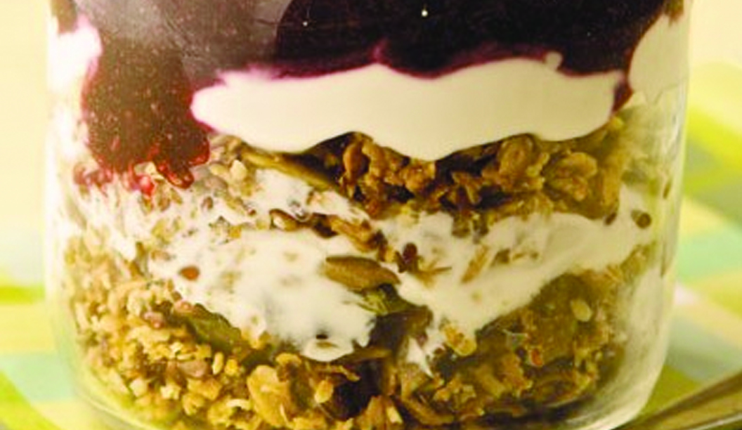 Muesli with Raspberry and Blueberry Coulis