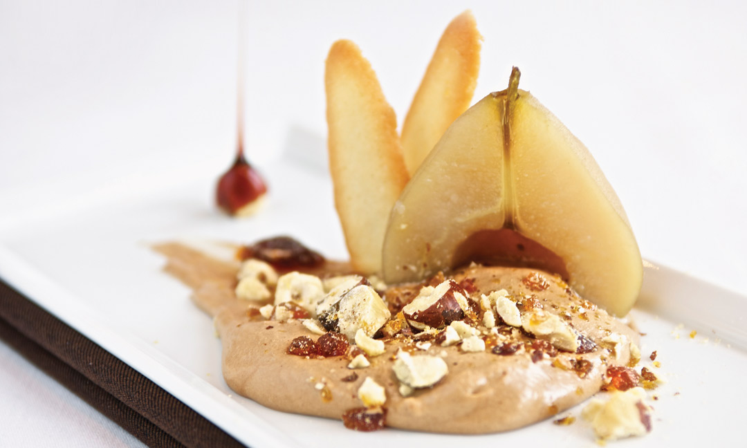 Poached Pear with Gianduja Sabayon, Hazelnut Praline and Langues de Chat by Pastry Chef Richard Warren of The Fort Garry Hotel