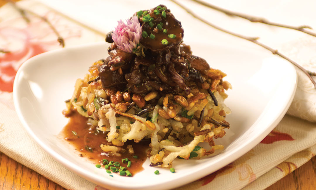 Wild Mushroom Ragoût on a Manitoba Wild Rice Latke by Chef Michael Neil of Pineridge Hollow