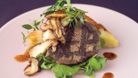 Grilled Bison Tenderloin, Potato Flan and Shiitake Mushroom Vinaigrette with Fresh Arugula by Chef Ben Kramer of Lux Solé