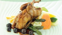 Pan-Roasted Quail with Black Currant Demi Glace, Vegetables and Arugula by Chef Lorna Murdoch of fusion grill