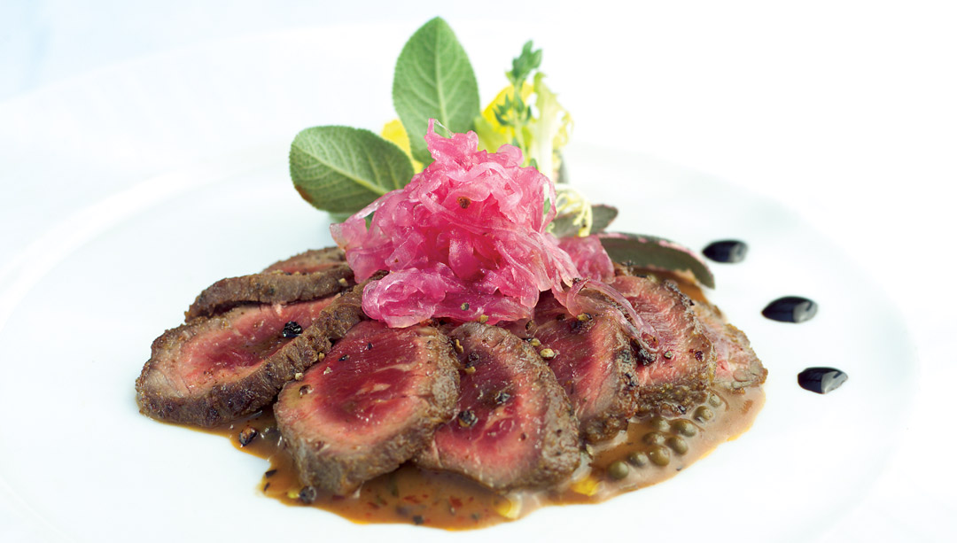 Seared Bison with Pickled Onion and Peppercorn Sauce by Chef Joe Dokuchie of Tavern In The Park